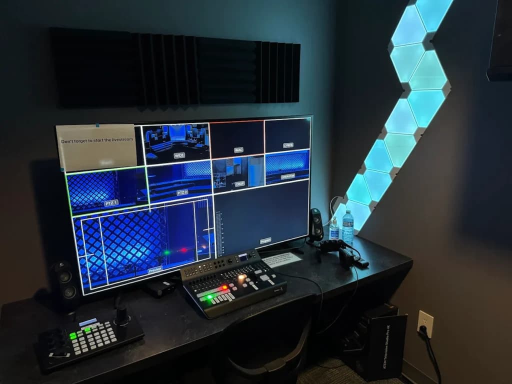 A clean, organised control room and server rack